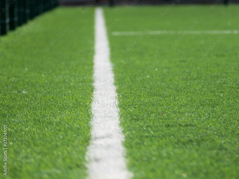 white line markings at the stadium artificial grass