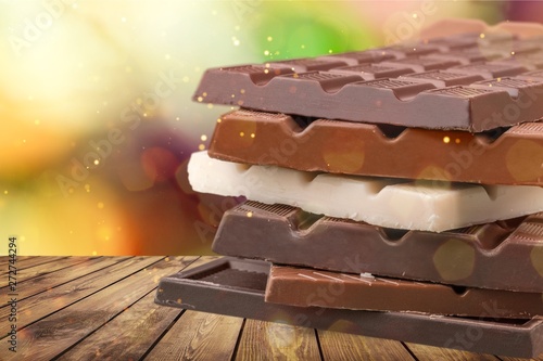 Delicious chocolates isolated on  background photo