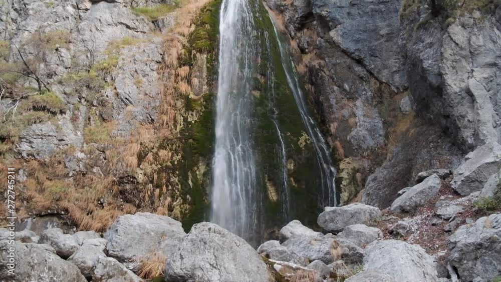 Hiking around Theth to the Blue Eye, Grunas waterfall and in the Albanian Alps during Fall season or autumn season Hiking around Theth to the Blue Eye, Grunas waterfall and in the Albanian Alps during Fall season or autumn season