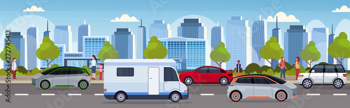 traffic jam with cars and caravan trailer truck driving on city road modern cityscape background flat horizontal banner