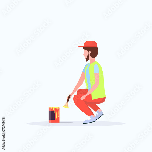 man cleaner in uniform using paintbrush and paint bucket male janitor painting street sidewalk decoration road service concept flat full length white background