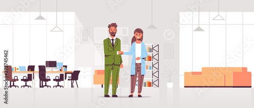 businesspeople man woman handshaking business partners couple hand shake during meeting agreement partnership concept modern co-working center office interior flat full length horizontal