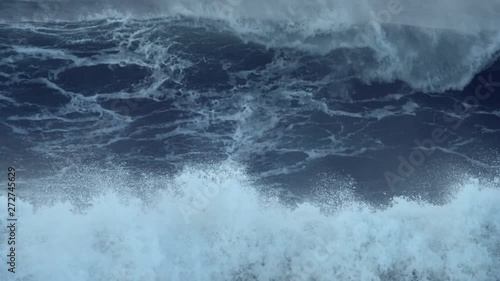 Big stormy sea waves windy weather from climate change cyclone hurricane