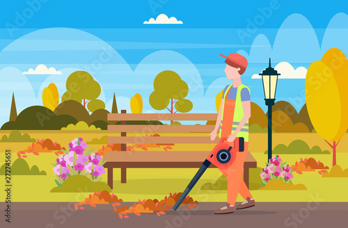 male street cleaner holding leaves blower man in uniform cleaning service concept city urban park landscape background full length flat horizontal