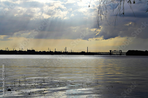 Ukraine. Dnieper. Thunderstorm approaching the city. Huge storm clouds, it is raining.