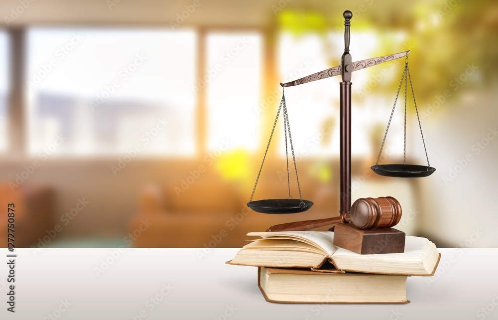 Justice Scales and books and wooden gavel on table. Justice concept Justice Scales and books and wooden gavel on table. Justice concept