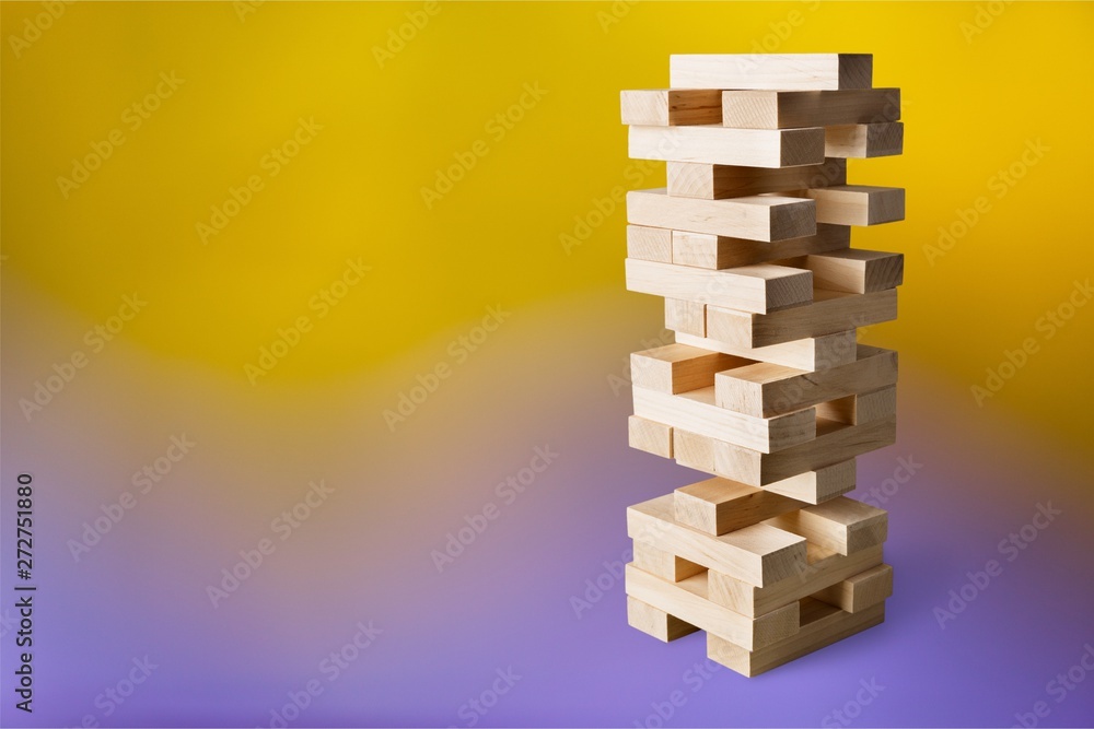 Tower build of wooden blocks, game of physical skill Tower build of wooden blocks, game of physical skill