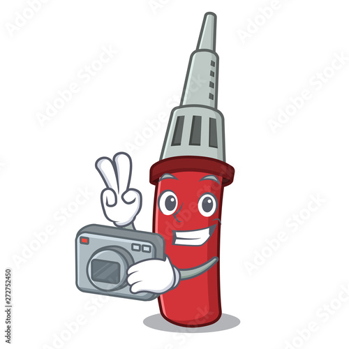 Photographer soldering iron in the character shape