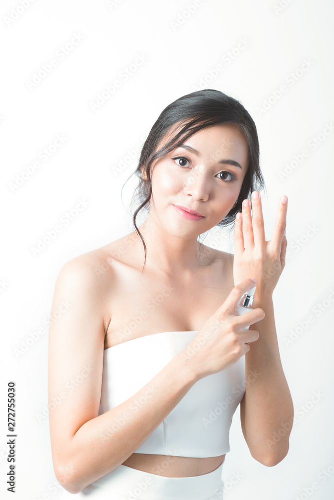 Beauty face woman show young facial treatment with spa and skincare in white dress Beauty face woman show young facial treatment with spa and skincare in white dress