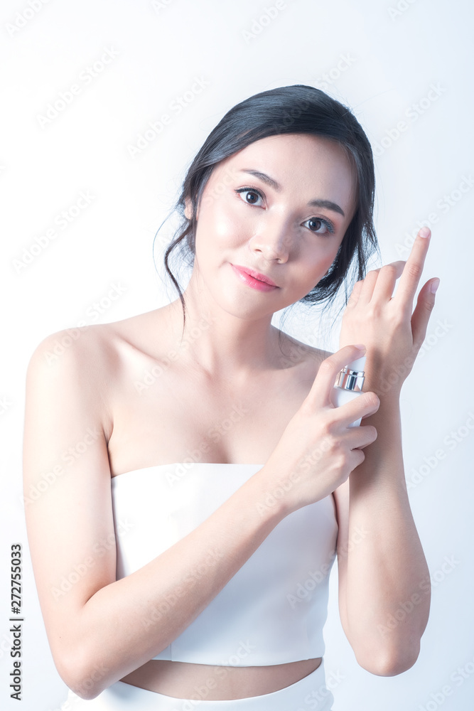 Beauty face woman show young facial treatment with spa and skincare in white dress Beauty face woman show young facial treatment with spa and skincare in white dress