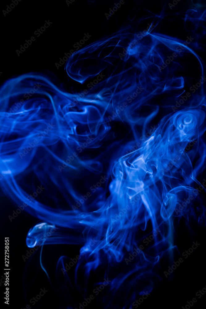 Blue toxic fumes movement on a black background.