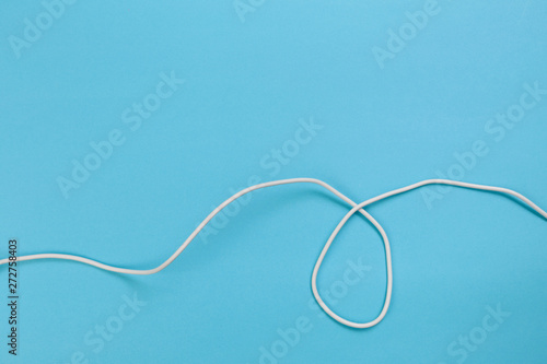 white power cable socket on blue background © Fototocam