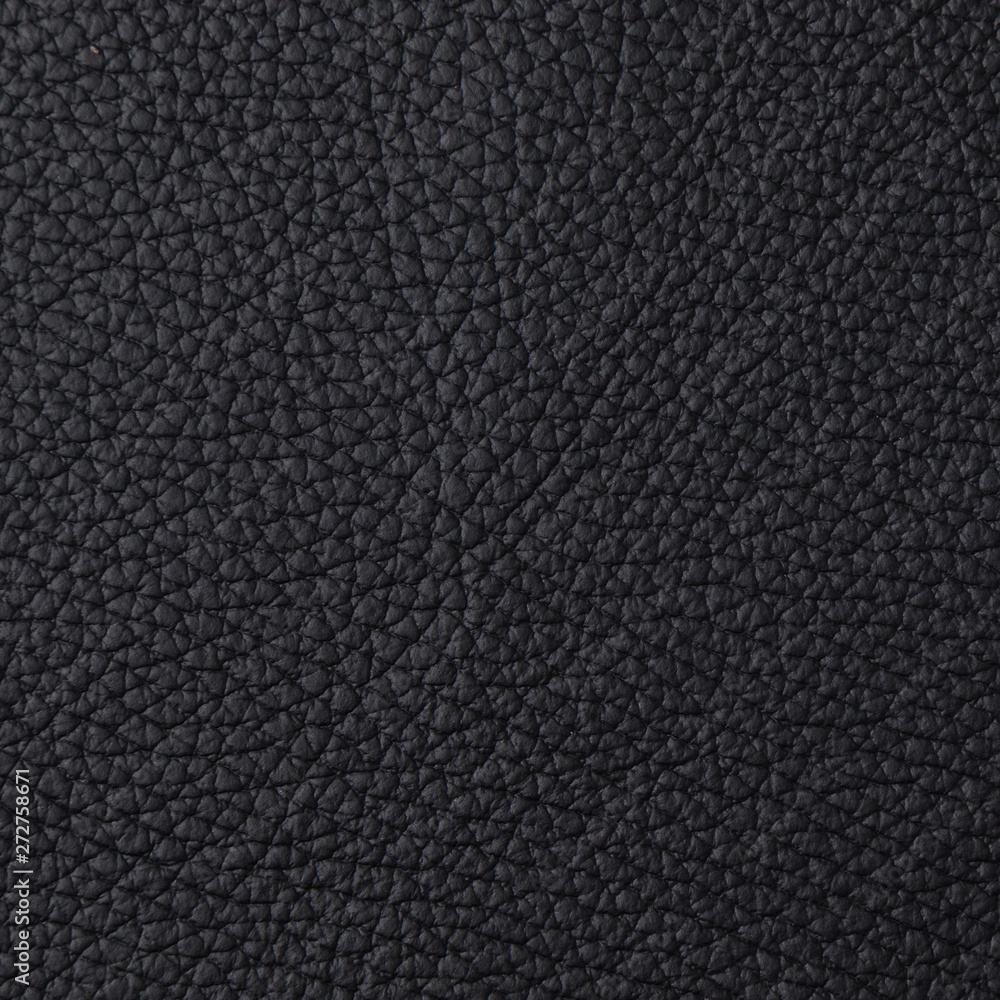 Closeup of dark color leather material texture background Closeup of dark color leather material texture background