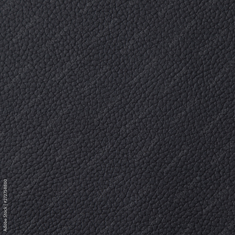 Closeup of dark color leather material texture background Closeup of dark color leather material texture background