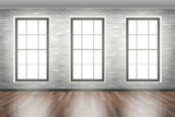 empty room interior design in loft style with wooden floor brick wall three windows