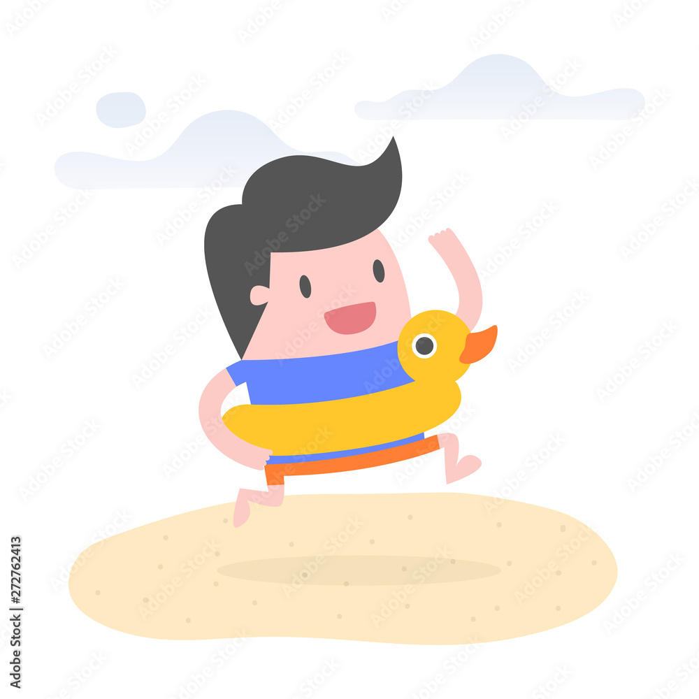 Young man on the beach with rubber duck swim ring.