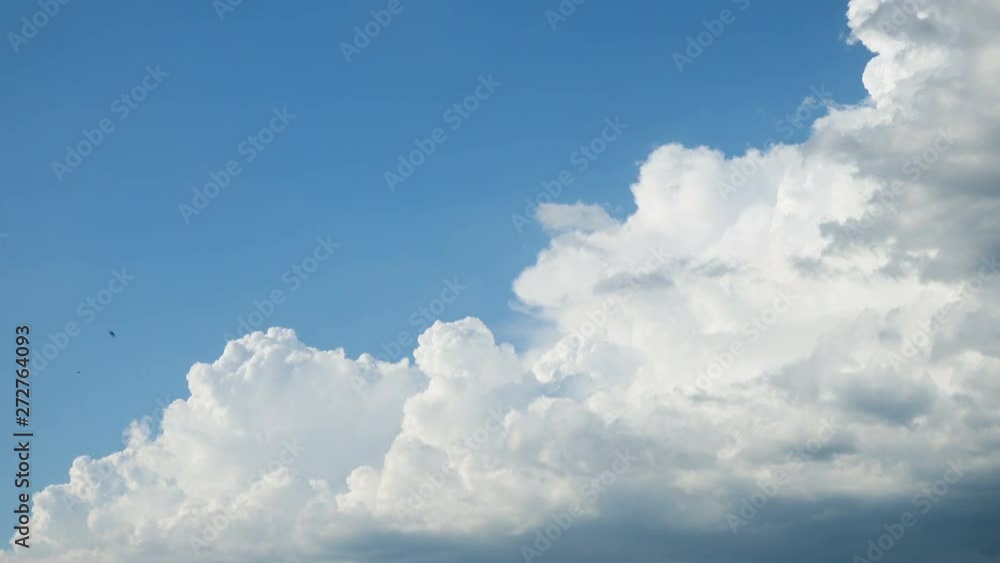 beautiful white clouds floating at the blue sky on a sunny day beautiful white clouds floating at the blue sky on a sunny day