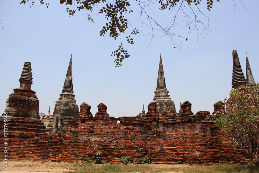 Ancient Bricks Walls With Old Bell Shpere Stupas And Buddhist Temples In Ayutthaya Historical Park Thailand