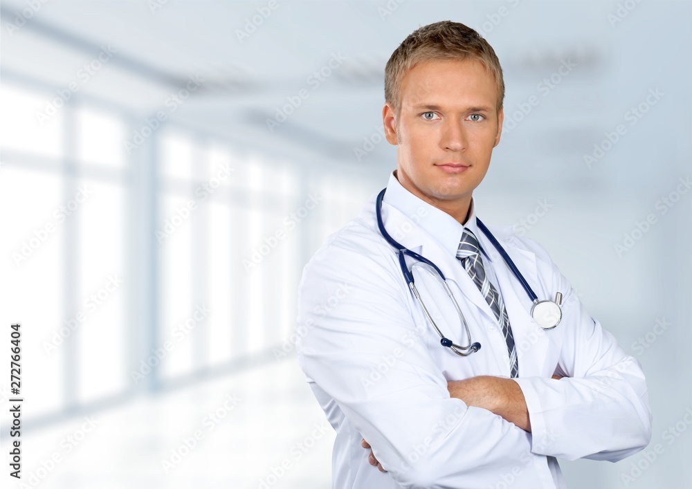 Smiling medical doctor with stethoscope. Isolated over  background