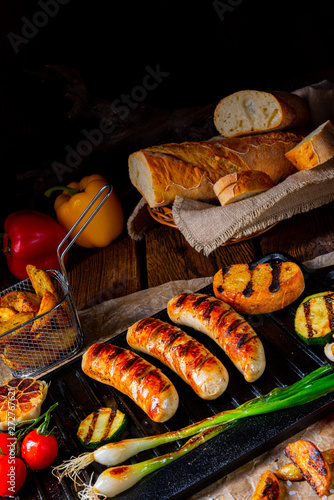 Delicious grilled sausage with various grilled vegetables