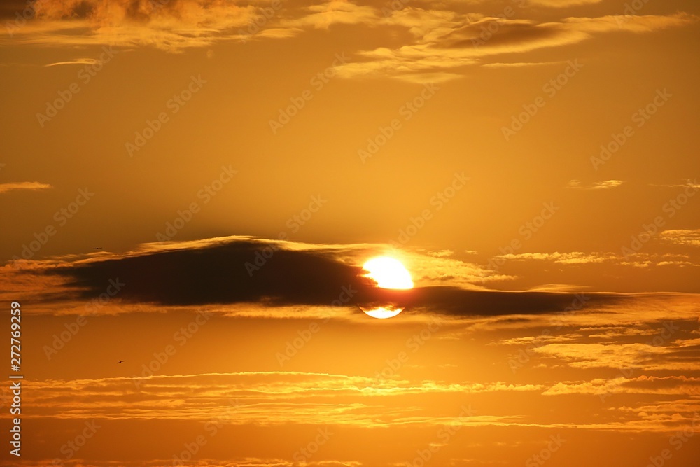 Beautiful golden fiery sunset background
