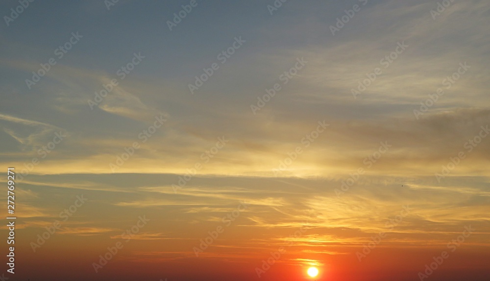 Beautiful yellow golden sunset in the sky, natural background
