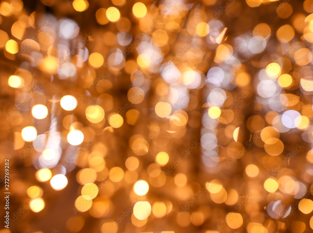 Golden bokeh lights as abstract background