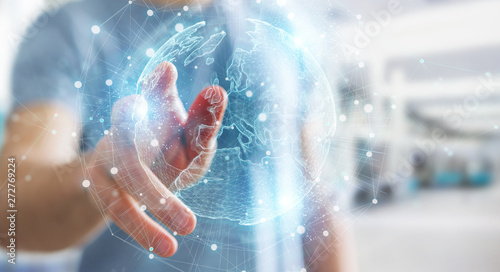 Businessman using Europe map globe network hologram 3D rendering