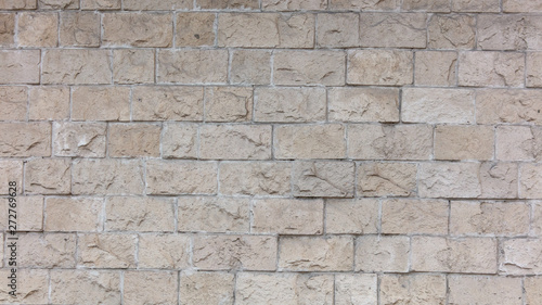 Decorative bricks on the wall of the house as a background
