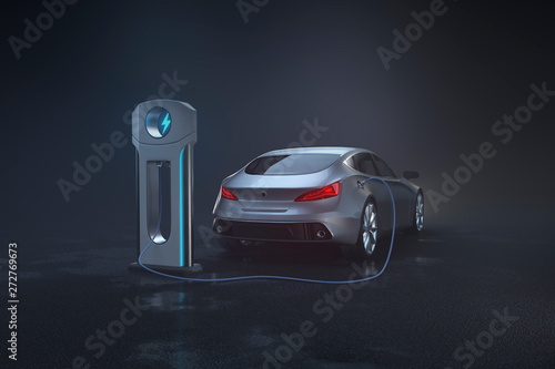 Electric car at charging station