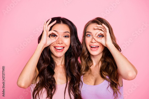 Portrait positive satisfied candid millennial carefree fool playful free time weekend summer holidays laugh laughter rejoice enjoy wavy curly long hairdo isolated fashionable clothes bright background