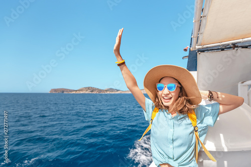 Carta da parati Happy asian woman in hat enjoying travel and vacation on Cruise ship