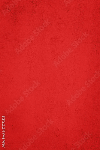 Modern ruddy paint limestone texture in red light seam home wall paper concept for flat Christmas background, Back burning concrete table top floor, wall paper granite pattern, ruby grunge surface 