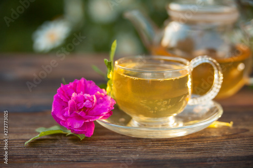 delicious green tea in beautiful glass bowl on table