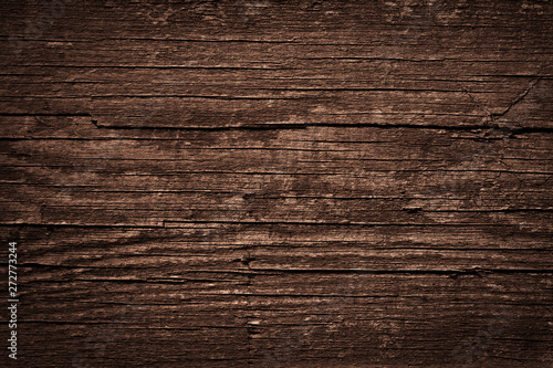 Fototapeta Naklejka Na Ścianę i Meble -  Texture of dark brown old rough wood. Abstract background for design. Vintage retro