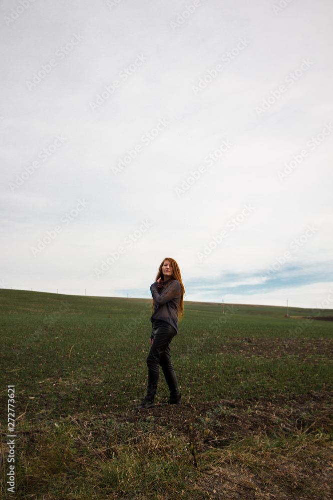 young beautiful woman in the field