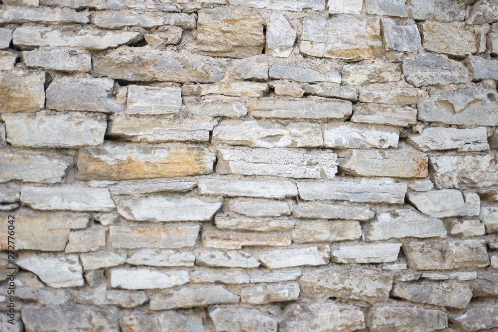 Texture of a stone wall. Old stone wall texture background.