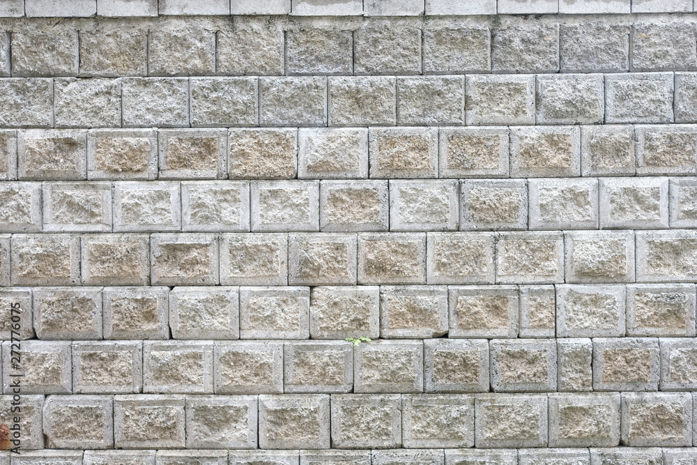 Obraz premium Weathered concrete blocks wall background