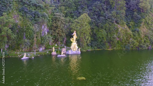 Dewi Danu sculpture in lake batur photo