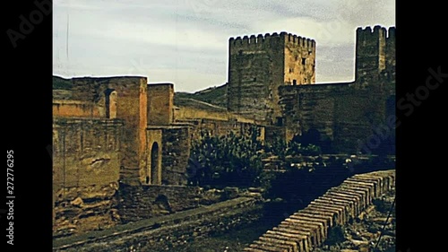 Aerial view of panorama from the top of the walls of Alcazaba of the Alhambra of Granada town. Unesco World Heritage Site. Historical archival of Granada city of Spain in 1970s.