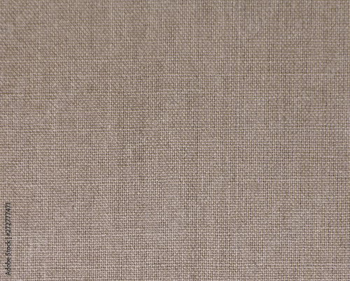 Textured background of gray natural textile 