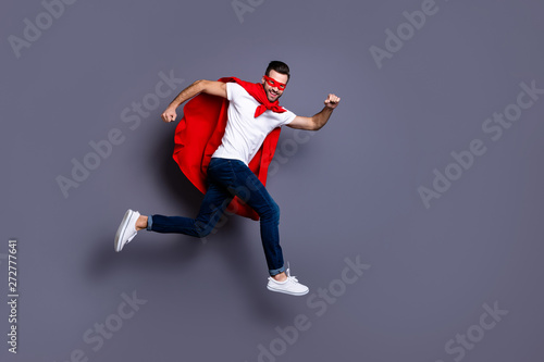 Fototapeta Naklejka Na Ścianę i Meble -  Full length body size view of his he nice-looking attractive content cheerful cheery glad virile masculine sportive macho bearded guy running marathon isolated over gray pastel background