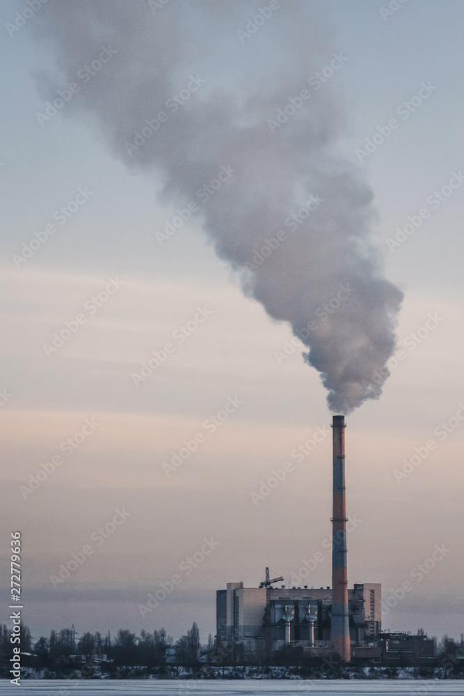 smoke from factory chimney pollutes nature.