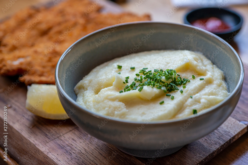 Delicious mashed potatoes side dish with schnitzel