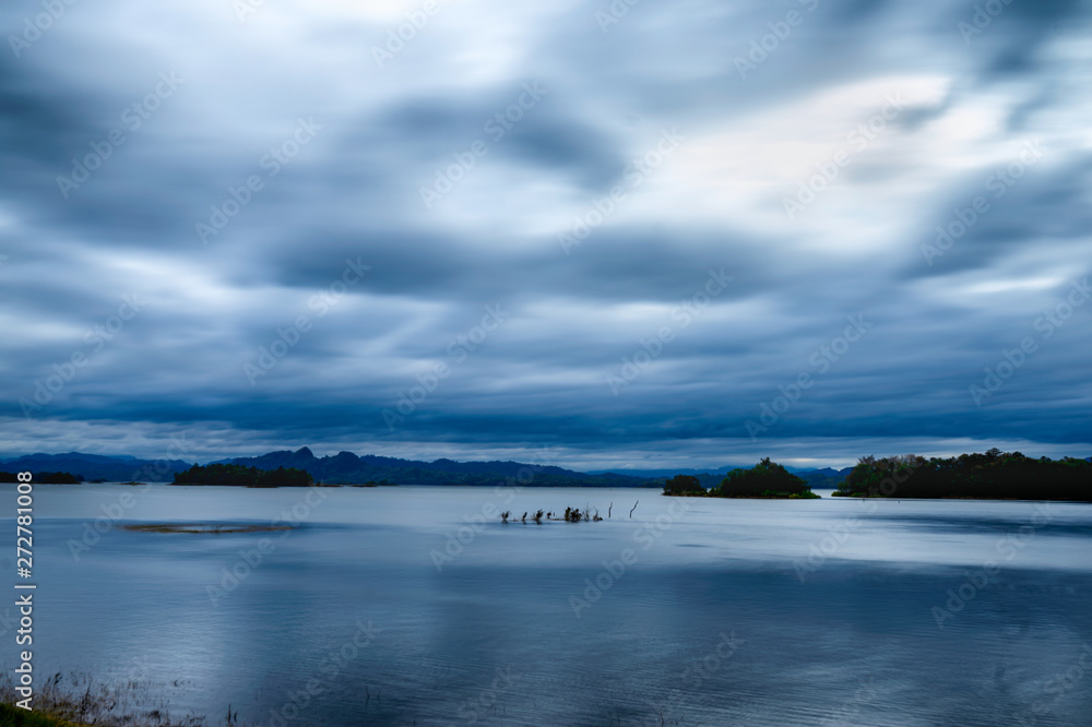 The large lake, the water wave is smooth in sunset. The large lake, the water wave is smooth in sunset.