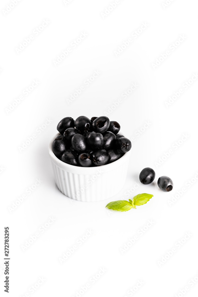 Black olives composition on a white background. Black olives composition on a white background.