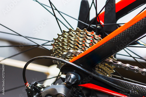 Close up bike chainrings and rear sprocket silhouettes photo