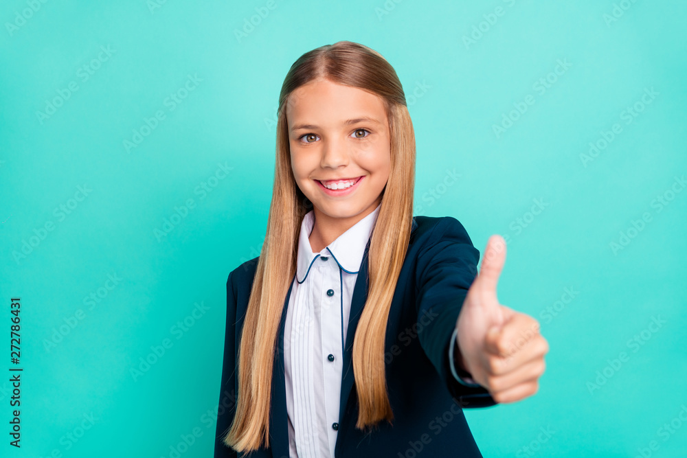 Close up photo beautiful she her little lady funky funny long hairdo hand arm thumb raised up approval quality news wear formalwear shirt blazer school form isolated bright teal turquoise background Close up photo beautiful she her little lady funky funny long hairdo hand arm thumb raised up approval quality news wear formalwear shirt blazer school form isolated bright teal turquoise background