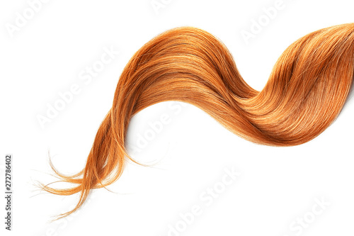 Fotografiet Red hair isolated on white background. Long wavy ponytail