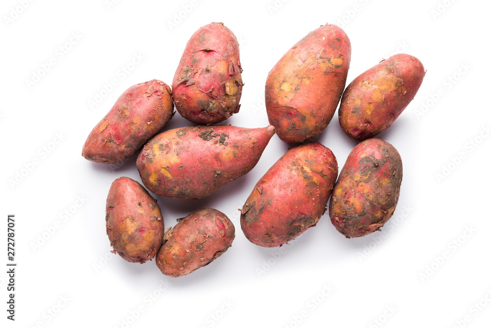 Unwashed red potatoes isolated over white background. Clipping path Unwashed red potatoes isolated over white background. Clipping path